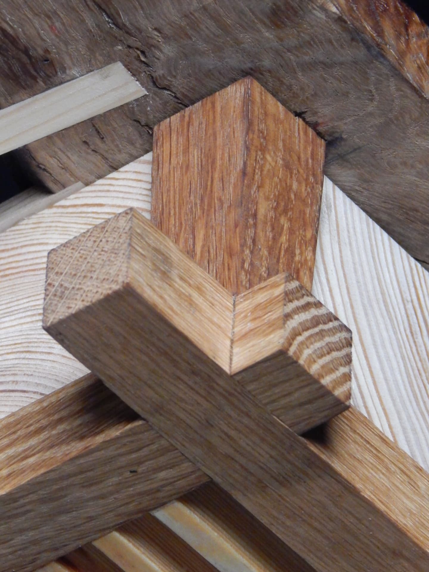 RIFT detail — interlocking oak and pine joinery holding the structure together