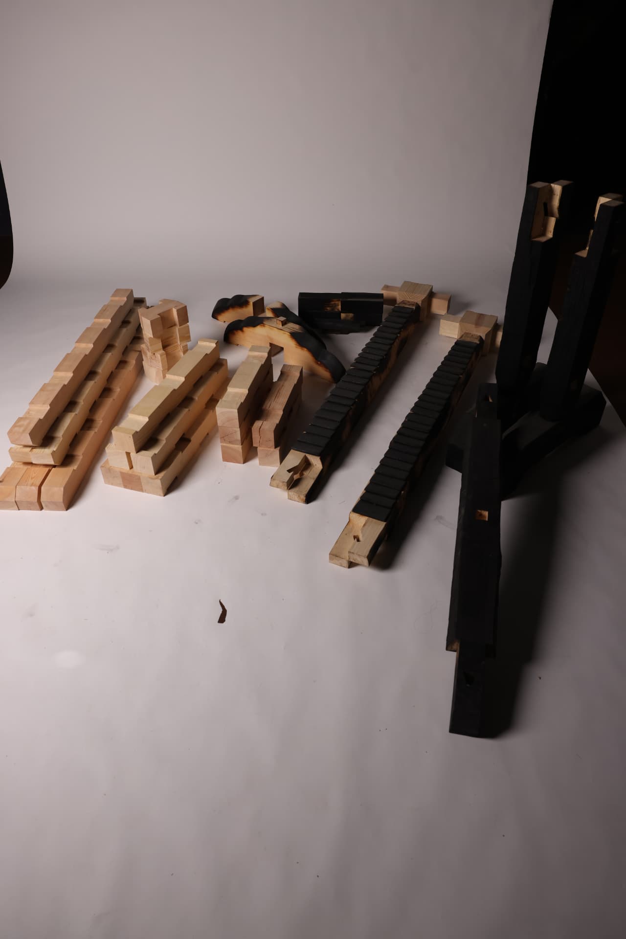 PASSAGE timber components arranged before assembly