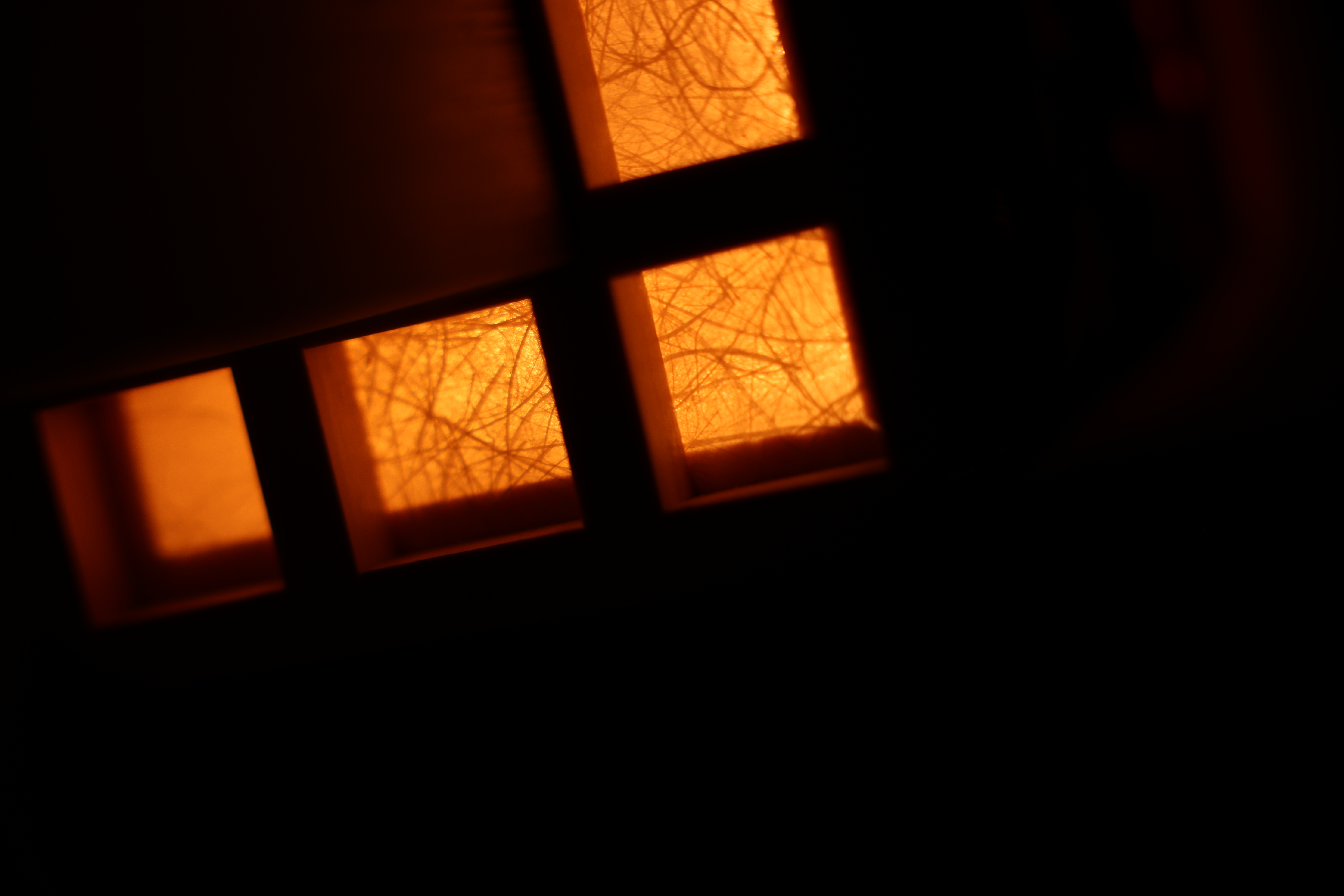SEED, glowing resin panels of the finished lamp in darkness